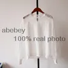 女性メッシュシアーブラウスシースルーランタン長袖ブラウスファッションボタン透明な白いシャツ女性ブルザ210308