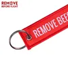 Usuń przed lotem Pierścień Kluczowy Pierścień Specjalny Tag Bagaż Label Czerwony Łańcuch Brelok Dla Prezentów Lotnictwa OEM Keyfob Moda Biżuteria