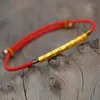 Pulseras de encanto tibetano budista nudos hechos a mano hilo hilo granos rojo cuerda negro tirando pulsera para las mujeres Y3T9