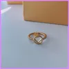 Met Diamanten Nieuwe Womens Mens Ringen Topkwaliteit Sieraden Accessoires Gouden Ring Letters Klassieke Tag voor Geschenken Ontwerpers Dames Ring D222143F