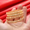 4 قطعة / الوحدة سوار الذهب 4-10 طفل الفتيات الطفل دائرة دبي دائرة أساور مجوهرات العربية الشرق الأوسط الأفريقي أزياء المعادن الإسورة Q0717