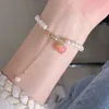Цепочка звена человеческие персиковые браслеты самка южная красная рука струна пресноводная жемчужная жемчужина дизайн Sen Tie Bracelet