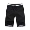 夏のソリッドカラーカジュアルショーツ男性ファッションルーズビーチパンツの綿の大きいサイズオーバーオールM-4XL 210713