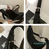 Nya Kvinnor Mode Soft Leather Hobos Bag Multilateral Plywood Finger Axel CrossBody Cups Rits Effects Väskor med Wide Bandkx49