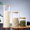 Contenitori per la conservazione degli alimenti in vetro trasparente Tappi di sughero Copri barattoli Bottiglie per sabbia Liquido Ecologico con coperchio in bambù Multi dimensionisa468219897