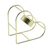 金のハート形の鋳鉄のスタンドの幾何学的な飾りカップホルダーの創造的な金属のキャンドルホルダー