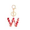 New Fashion English Letter Keychain Resin Flowers Red Rose Petal Foil Filling Pendant Portachiavi Charms per borsa da donna