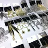 Venta al por mayor 40 pares de pendientes de gota para mujer Dangle Pendientes de plata de oro garabato de gancho de oro Joyería de moda Favor de boda Favor de regalos MEZCLAS DE MEZCLA