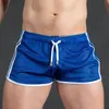 Men Shorts Casual Gym Fitness Training Shorts Sexy Mesh Breathable Sports Beach Trunks Male Clothing New Comfortable Y200901