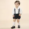 Комплекты одежды Малыши для мальчиков для мальчиков для детей 2022 Детские Летние костюмы Девушка Мальчики Топы + Шотландские Шорты Устройства Детская Одежда Одежда Испанский Маленький