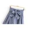 Mais recentes mulheres chique calções sólidas arco laço faixas bolsos elástico paperbag cintura feminina elegante shorts pantalones cortos 210306