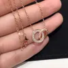 Collana alla moda con doppio anello e due file di diamanti, per uomini e donne, regali per coppie con una confezione squisita240D