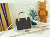 Kvinnors mini högkvalitativa kvällsklänning väskor mode färg bokstäver kanfas läder messenger axelväska handväska utställningsfest lyx M61252 s 15.5 * 10x7cm