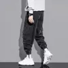 Mode Streetwear hommes jean noir coupe ample multi-poches décontracté Denim Cargo pantalon Hip Hop Joggers jambe large coton pantalon