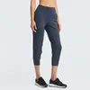 Elastic Lulu Pocket Yoga Leggins Pants z pęczką stóp Capris Solid Kolor Running Fitness Gym Ubrania Kobiety sportowe joggery