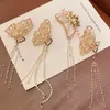Eenvoudige vlinder perl ketting kwastje vrouw haar klauw mode goud zilveren klemmen voor vrouwen metalen haaraccessoires