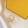 Diseñadores de oro Anillos de bodas para mujer Pareja Luxurys Moda Anillo de compromiso Amantes Regalo Diamante Fiesta de plata Anello de alta calidad