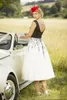 Vintage czarno-biała suknia ślubna długość herbaty 2021 krótka linia suknie ślubne aplikacje koronkowe bez rękawów Tank Country Bride suknie bez pleców