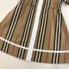 Designer Girl Dress Fashion Multi-Coll Striped Printing Drukarnia Druk dla dzieci 110-150 cm Sukienki z klapami z krótkim rękawem