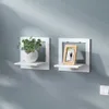 Творческий цветочный горшок стоять настенная полка Бесплатный удар настенный телевизор фона настенный вешалка для спальни балкона прикроватная стена домашнего декора 210705