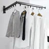 Opvouwbare muurhangende kleding droogrek indoor balkon intrekbare hanger handdoeken organisator