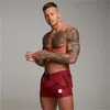 Męskie siłownie Fitness Kulturystyka Szorty Moda Trend Letni List Dorywczo Fajne Krótkie spodnie Designer Mężczyzna Jogger Workout Plaża Breechcloth M-3x