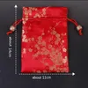 150個のサシェの中国のシルクブロケードジュエリー包装袋小さな巾着ギフトバッグラベンダースパイス香水収納ポケットが並ぶ