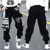 Fashionable Autumn Kids Sport Pants Loose Camouflage Joggers for Big Boys Teenage Elastic Waist Trousers Spring Clothes 211103