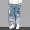 Moda Streetwear Uomo Jeans Retro Blu Loose Fit Stampato Designer Denim Harem Pantaloni Homme Pantaloni da jogging Hip Hop con fondo allentato
