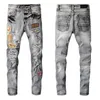 Jeans da uomo invernali firmati Design di alta qualità Toppa colorata con foro Impiombato Strappato High Street Motociclista con gamba sottile Denim distrutto