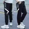 För barn tjejer lasten ren färg byxor ficka lös sport hög midja elastiska barn casual löpande pants 210303