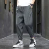 Hybskr сплошной цвет мужчин гарем брюки японская уличная одежда человек повседневная свободная брюки мода мужские бегуры брюки брюки 3xL 211201