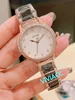 Klassiska nya kvinnor White Black Ceramic Wristwatch Ladies rostfritt stål Geometriska kristalldiamantklockor Ceramica Clock 30mm