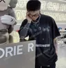 21ss Erkekler Baskılı T Shirt Polos Tasarımcı Almanya Paris Mektuplar Baskı Giysi Erkek Gömlek Etiketi Gevşek Stil Siyah Beyaz Haki