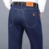 SHAN BAO Automne Classique Ajusté Droit Stretch Denim Jeans Style En Cuir Jeunes Hommes D'affaires Casual Marque 211111