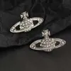 أقراط الموضة اتجاهات المجوهرات الإضافية ذات الأقراط الكوكب الإبداعية زحل الماس أنثى 9736599