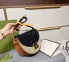 2021 Luxury Designers Lady Fashion Half Moon Bags Saddle Bag Letter Plain Canvas Cowhide Cover Lock Card Holders Coin Purses Wallet Handbags Interior Zipper Pocket