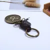 Retro Гороскоп Знак диска для бревта Кожаный плетение 12 Бронзовый Constell Key Cring Bag Vise Holder Rings для женщин Мужчины Модные украшения