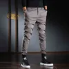 Мужчины повседневные брюки корейский уличная одежда черная растяжка стройная подходит брюки 211201