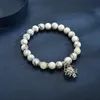 Gloeiende Lotus-vormige kralenarmband Klassiek Trendy Unisex Charm Armbanden Paar Cadeau Mannen Accessoires Gebed Boeddhisme Sieraden