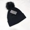 Vrouwen en mannen Winter Beanie Letters Wol Skull Caps 3 Kleuren met Tag Unsex Designer Brei Bal Hoeden Groothandel