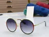 Män solglasögon kvinnor designer solglasögon sommarstil anti-ultraviolett retro rund tallrik full ram mode glasögon kommer med låda 0061s