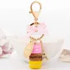 Creative Macarons Cake Keychain LADUREE Effiel Tower Ribbon Key Chain Ring Women Handbag Bag Charm Fashion Trinket Wholeasle G1019