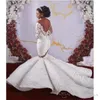 Abiti da sposa a sirena con spalle scoperte in cristallo africano maniche lunghe di lusso aso ebi abito da sposa in pizzo trasparente con apertura sul retro nigeriano