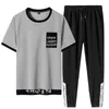 Plus storlek sommar män t-shirt uppsättningar 2 styck kortärmad sportkläder tracksuit män casual jogger svett kostymer 6xl 7xl 8xl y0831