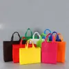 Mehrfarbige Vlies-Einkaufstaschen mit Griffen, faltbar, stehend, umweltfreundliche Verpackungsbeutel, Einkaufstüten aus Tüchern