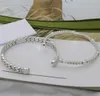Neue Mode Hohe Qualität Gestreifter Brief Armband Einfache Unisex Universal Silber überzogene Retro-Armbandversorgung NRJ