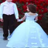 Abito da ballo bianco Abiti da ragazza di fiori per matrimonio Tulle Fiocco Abiti da spettacolo senza maniche da principessa Puffy Little Girl Abito da prima comunione 2021