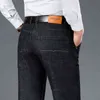 2021 Herfst Winter Nieuwe Heren Dikke Jeans Koreaanse stijl Zakelijke Mode All-match Denim Broek Mannelijke Merk Stretch Losse Broek G0104