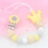 Porte-sucettes couronne de fleurs Accessoires d'alimentation pour bébés Clips de chaîne de sucettes sûrs pour bébés Euro America 32C3